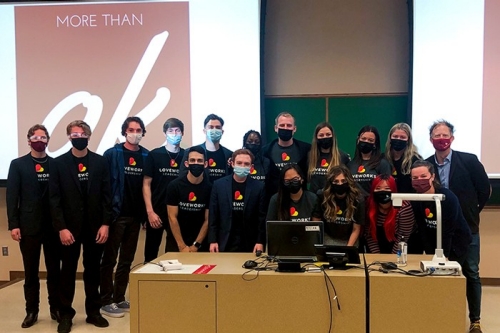 IBC teams gather for a group photo in one of the classrooms at Price College