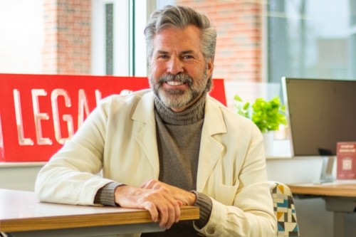 David Kinsinger sits at a table in the new Entrepreneurial Law Center