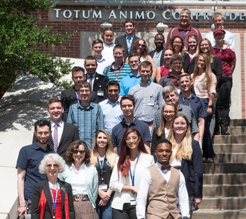 Formal group picture of the 2018 group and their mentors at the National Weather Center.