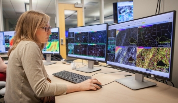 NOAA researcher monitors flash flood software