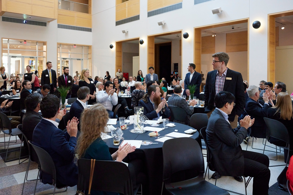 Early Career Award recipients stand in recognition