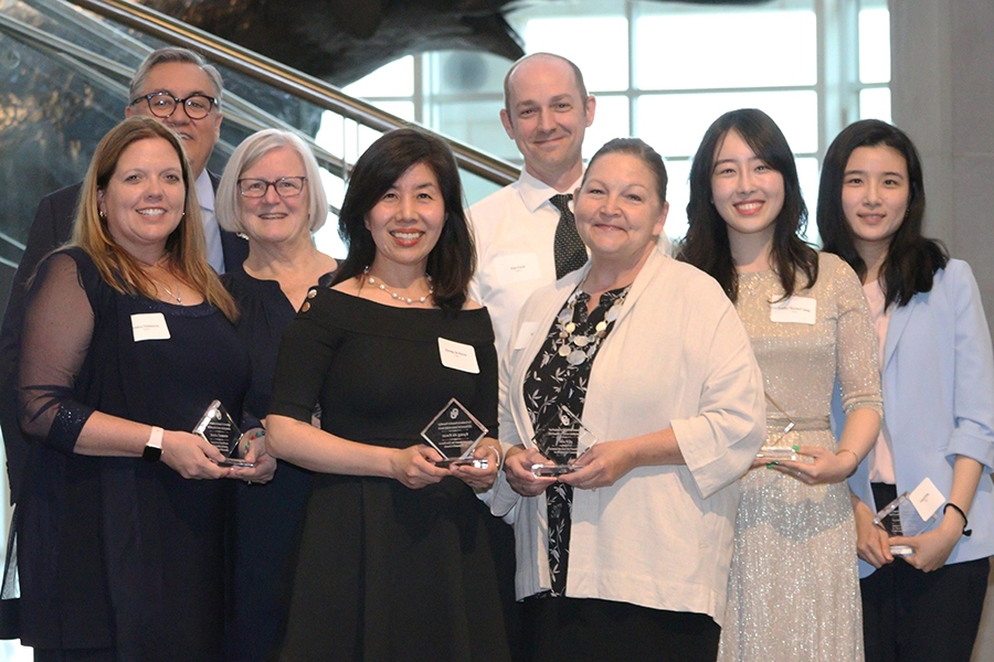 Tomas Diaz de la Rubia, with Happy Teach Awardees (Principal Investigator Kyong-ah Kwon, Ph.D., and co-PIs Tim Ford, Ph.D., Sherri Castle, Ph.D., Diane Horm, Ph.D., Wonkyung Jang, Ph.D., and Corey Peltier, Ph.D. From the Dodge Family College of Arts and Sciences team members include: Seulki “Rachel” Jang, Ph.D., Brenda Lloyd-Jones, Ph.D., Yong Ju Jung, Ph.D., Le Wang, Ph.D., and Julie Miller-Cribbs, Ph.D.; Mia Kile, Ph.D., from the Christopher C. Gibbs College of Architecture; Ken Randall, Ph.D., Jessica Tsotsoros, Ph.D., Susan Sisson, Ph.D., and Carolyn Cheema, Ph.D., from the College of Allied Health, and from the School of Community Medicine at OU-Tulsa, Michael Baxter, DO.)