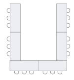 Rectangular tables and chair icons in a U shape.