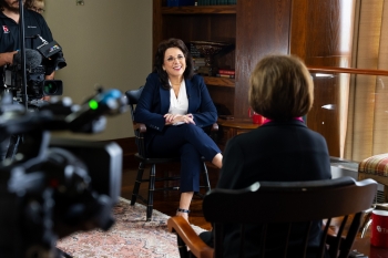 Peggy Stephenson being interviewed KOTV Channel 6 news on OU-Tulsa campus