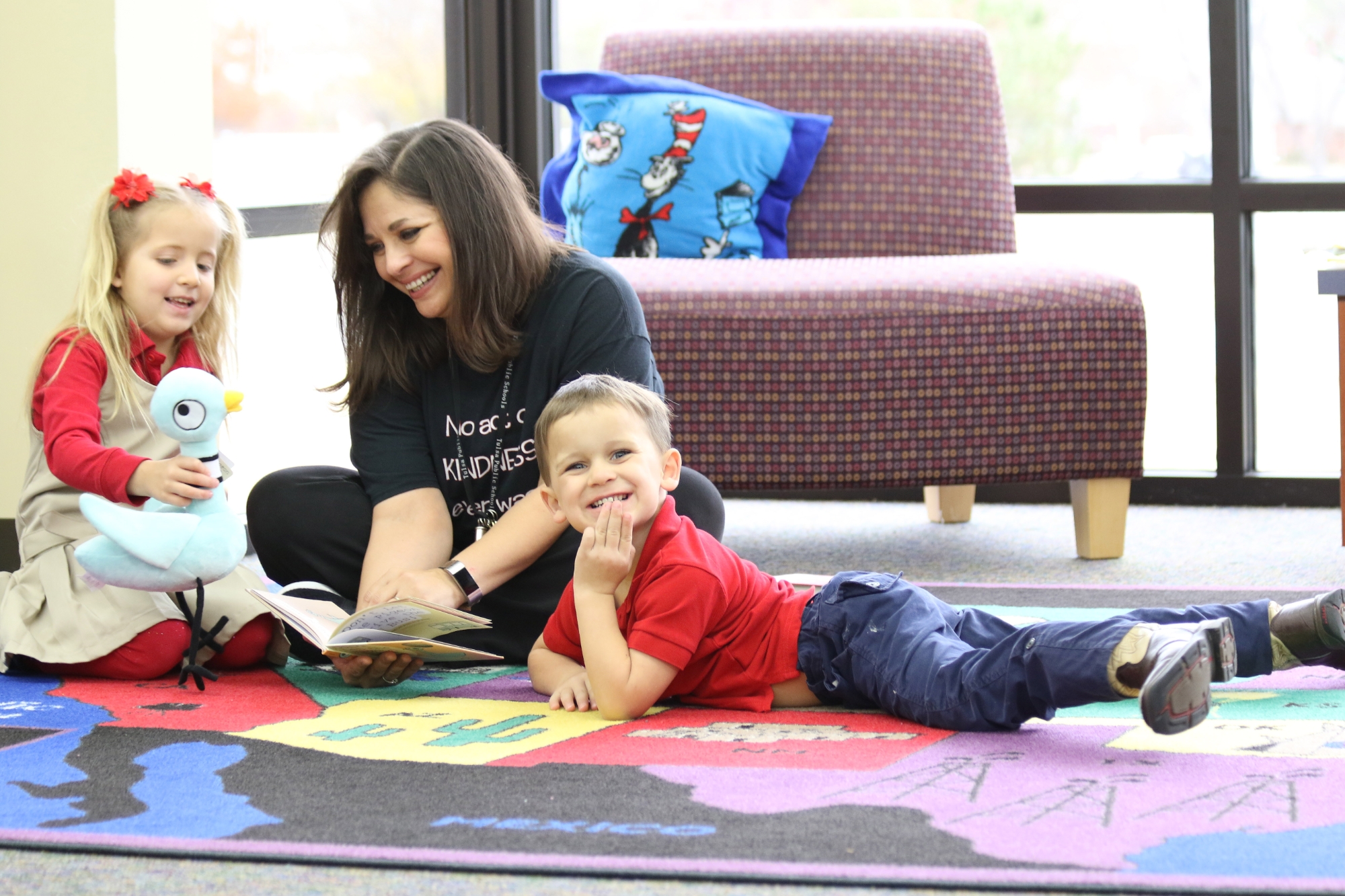 ECEI instructor interacting with children