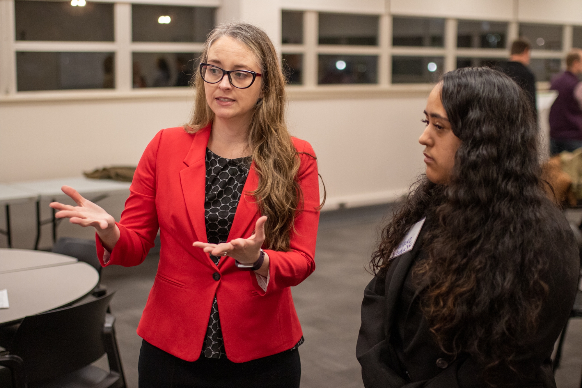 Two students at OU-Tulsa student presentation event