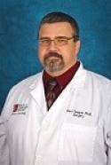 Kent Teague.