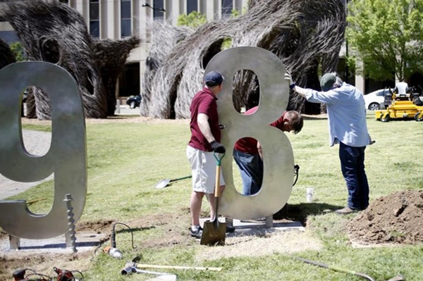 Urban Design students assist in the installation of an art piece in downtown Tulsa